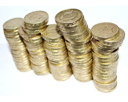 Image of several piles of pound coins